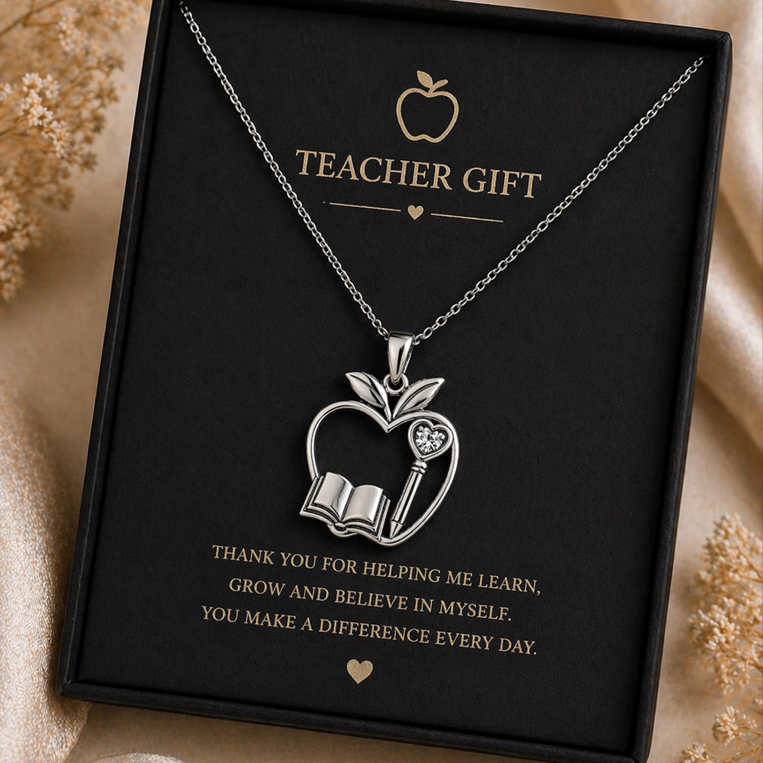 Teacher Apple jewelry design featured in the Rimossa meaning guide