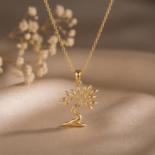 Olive Drift Bonsai jewelry design featured in the Rimossa meaning guide