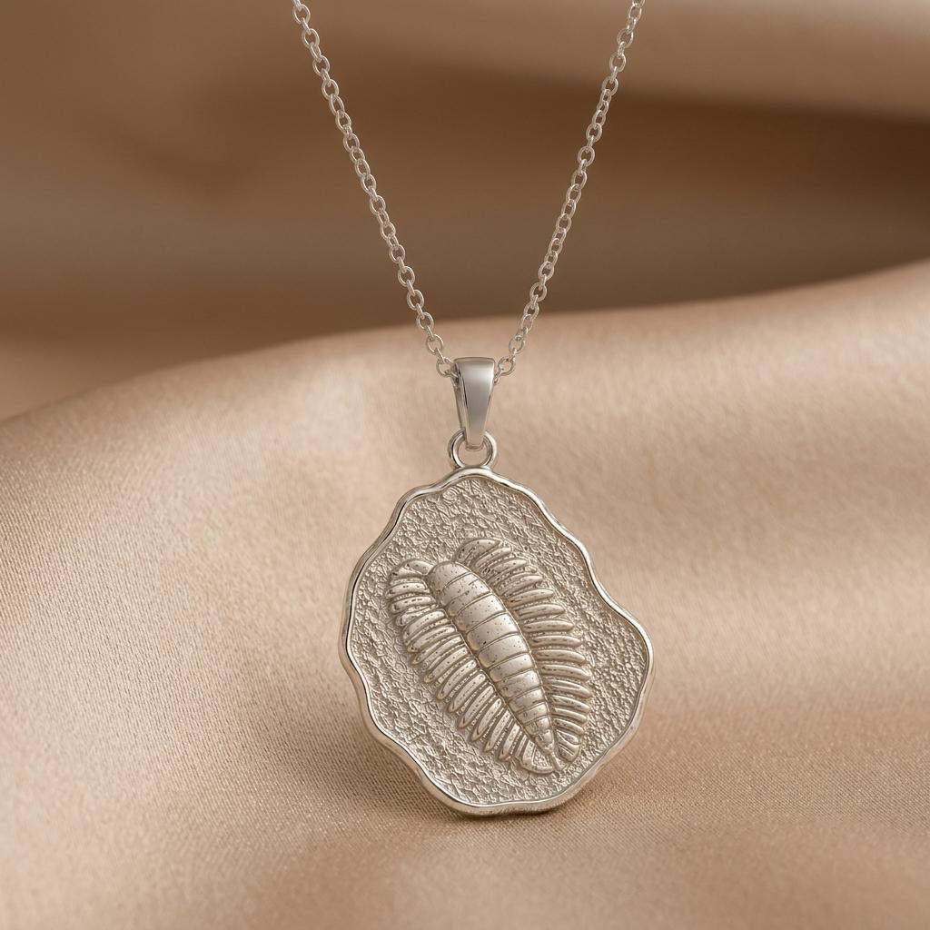 Wiwaxia Fossil jewelry design featured in the Rimossa meaning guide