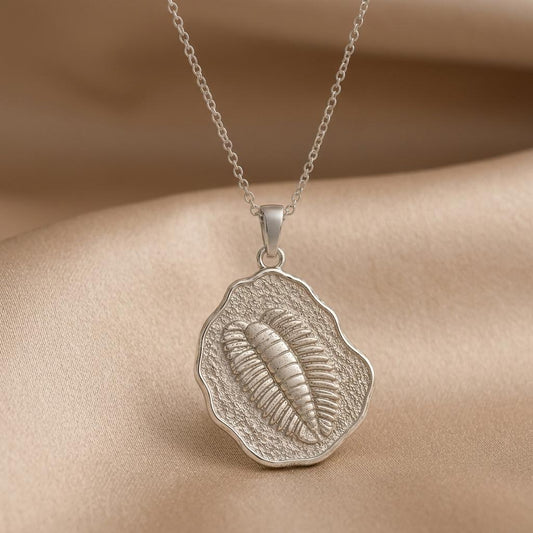 Wiwaxia Fossil jewelry design featured in the Rimossa meaning guide