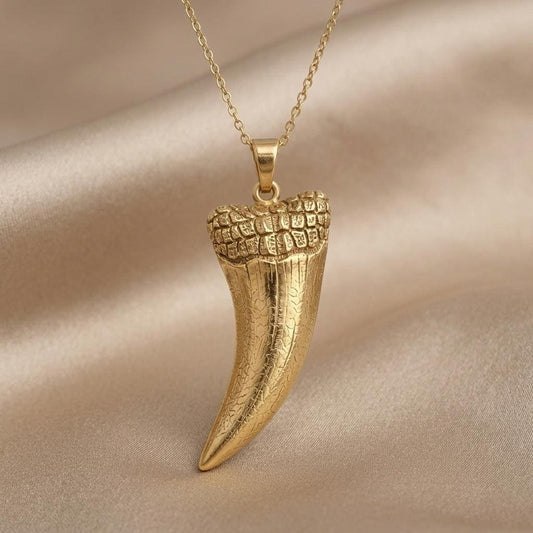 Sarcosuchus Tooth jewelry design featured in the Rimossa meaning guide
