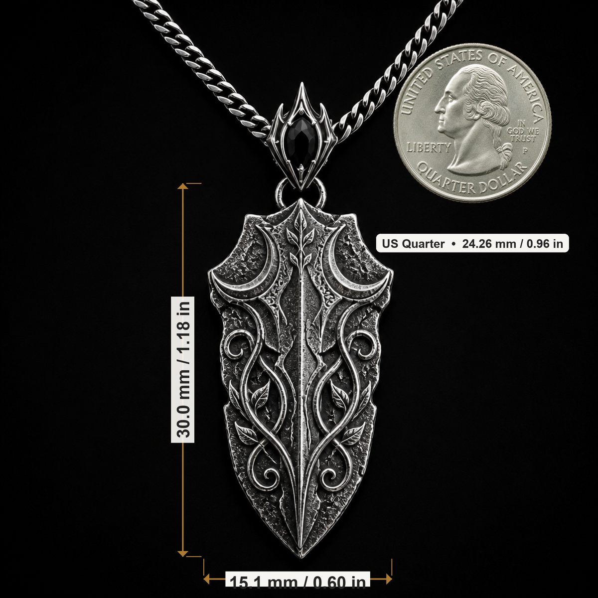 Oxidized 925 sterling silver pendant necklace with a blade-shaped relic pendant, crescent moon details, raised vine engraving, decorative bail and curb chain on a black background.