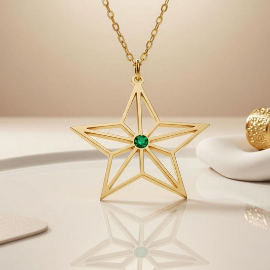 Front product close-up of the angular openwork star and round green accent